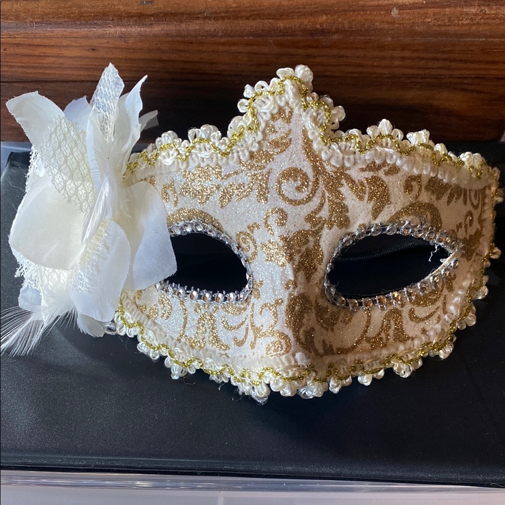 Elegant Gold and Cream Face Mask